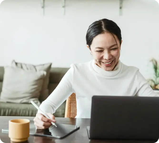 Woman using Oval on a laptop